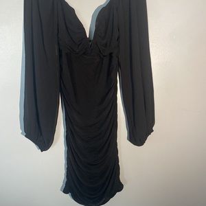 L’VOW STUDIO: black dress with long sleeves